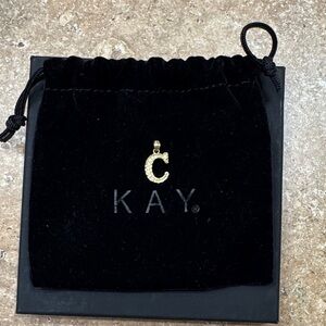 Gold Pendant with Black Velvet Pouch